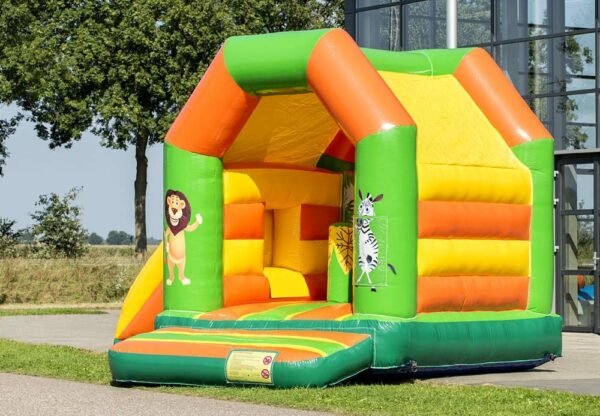 Chateau gonflable pour enfant, couleur orange - vert - jaune, avec toboggan